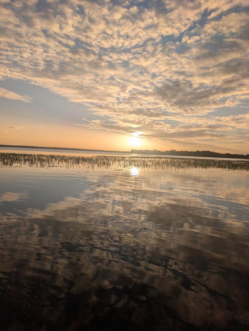 Clouds reflected in still water